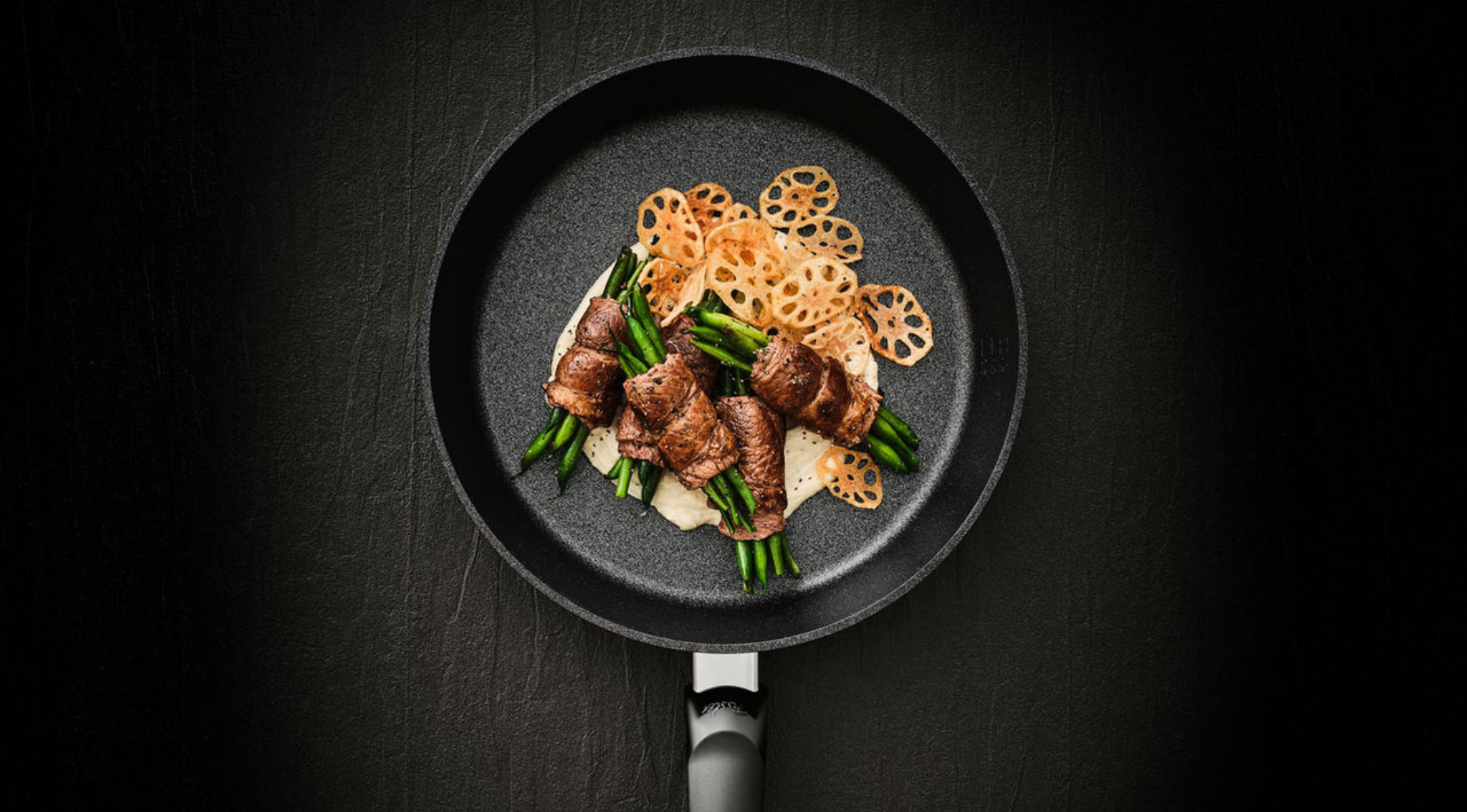 Rinderlende mit grünen Bohnen und gebratener Lotuswurzel