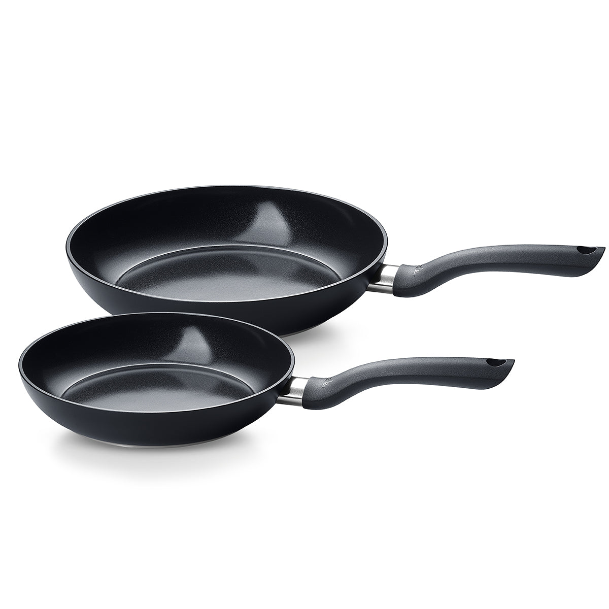 Fissler Essential® 2-Piece Pan Set: two black non-stick frying pans (24 & 28cm), overlapping, on white. German precision design.