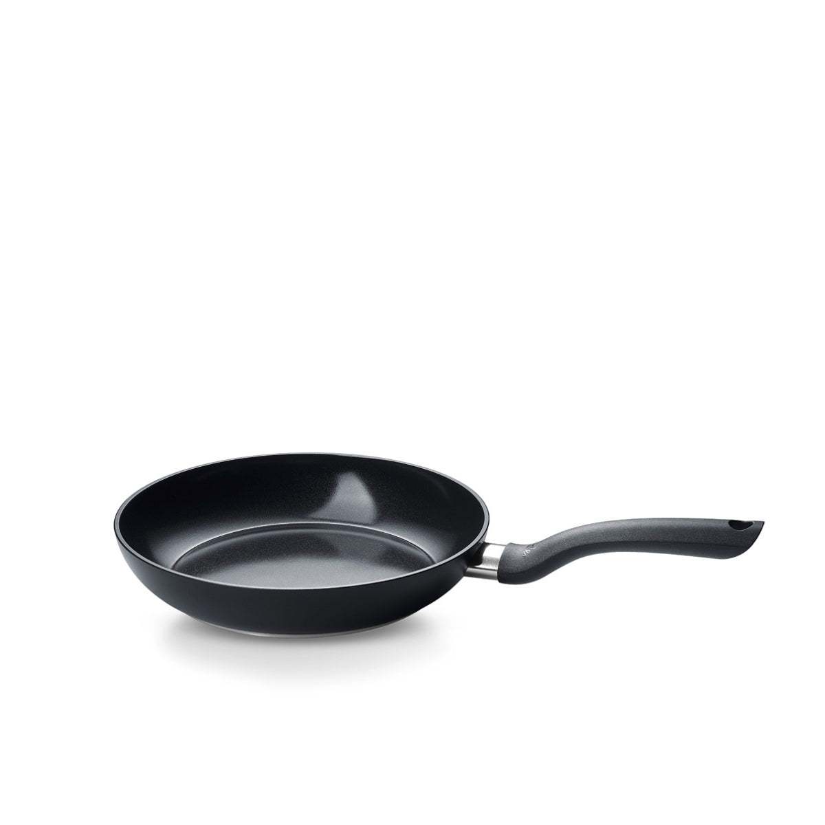 Fissler Essential® Pan - modern, PFAS/PTFE-free non-stick pan with ergonomic handle. Made in Germany. Pictured at an angle.