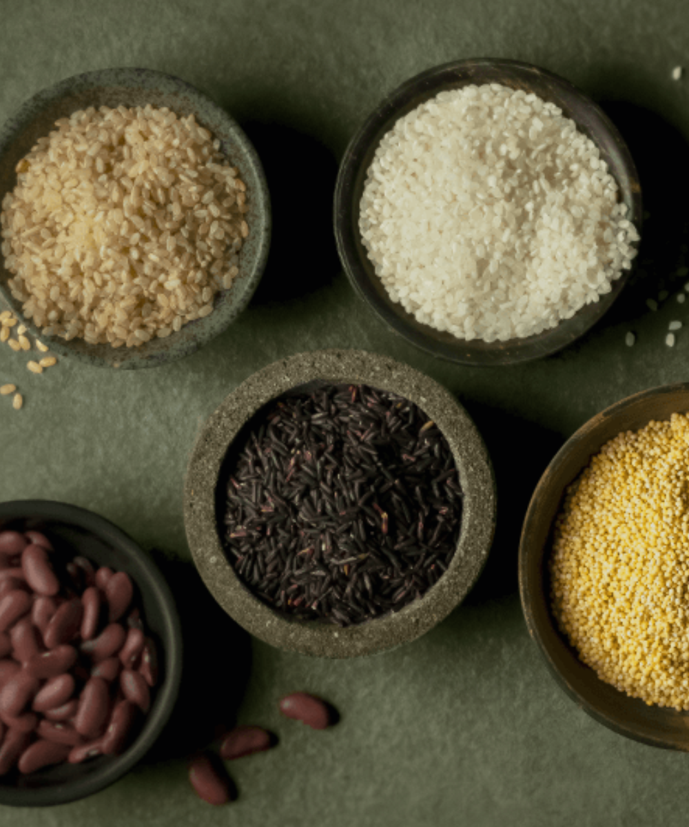 Five Fissler bowls show brown rice, white rice, black rice, kidney beans, and millet - precision and timeless German design.