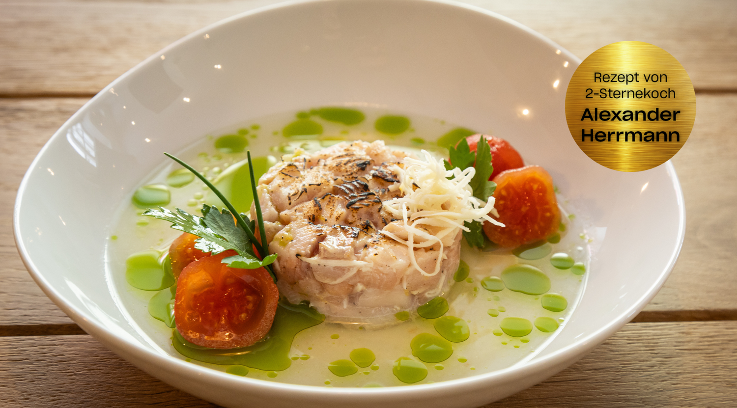 Alexander Herrmanns geflämmte Meerrettich-Forelle mit weißem Tomatensud und Kräuteröl