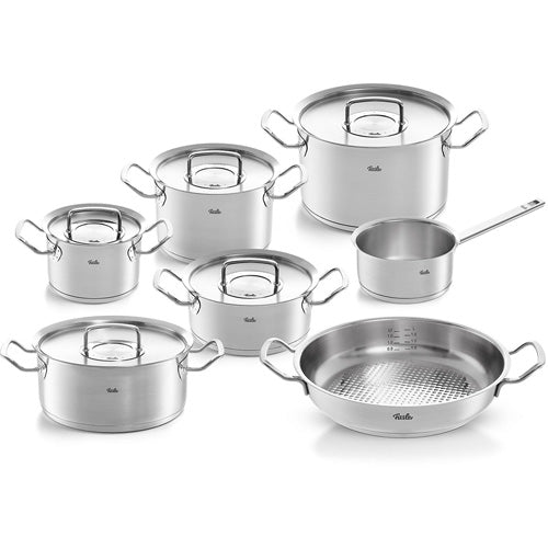 A seven-piece stainless steel cookware set from Fissler’s Original-Profi Collection® is elegantly displayed against a white background, showcasing signature pots, saucepans, stockpots, and a frying pan with robust handles and precision-fitted metal lids. Crafted in Germany since 1845, this premium set represents Fissler’s heritage of innovation, durability, and timeless design—trusted by professional chefs and home cooks seeking quality that endures.