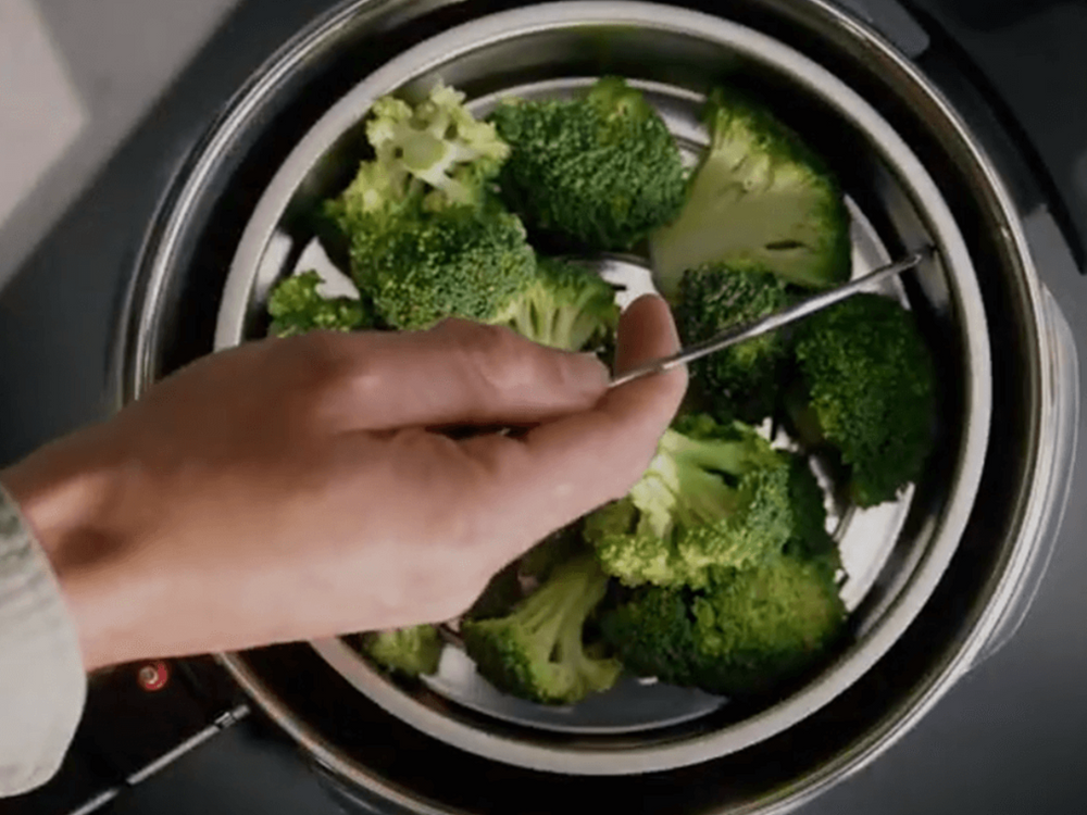 Multi-level cooking in a pressure cooker