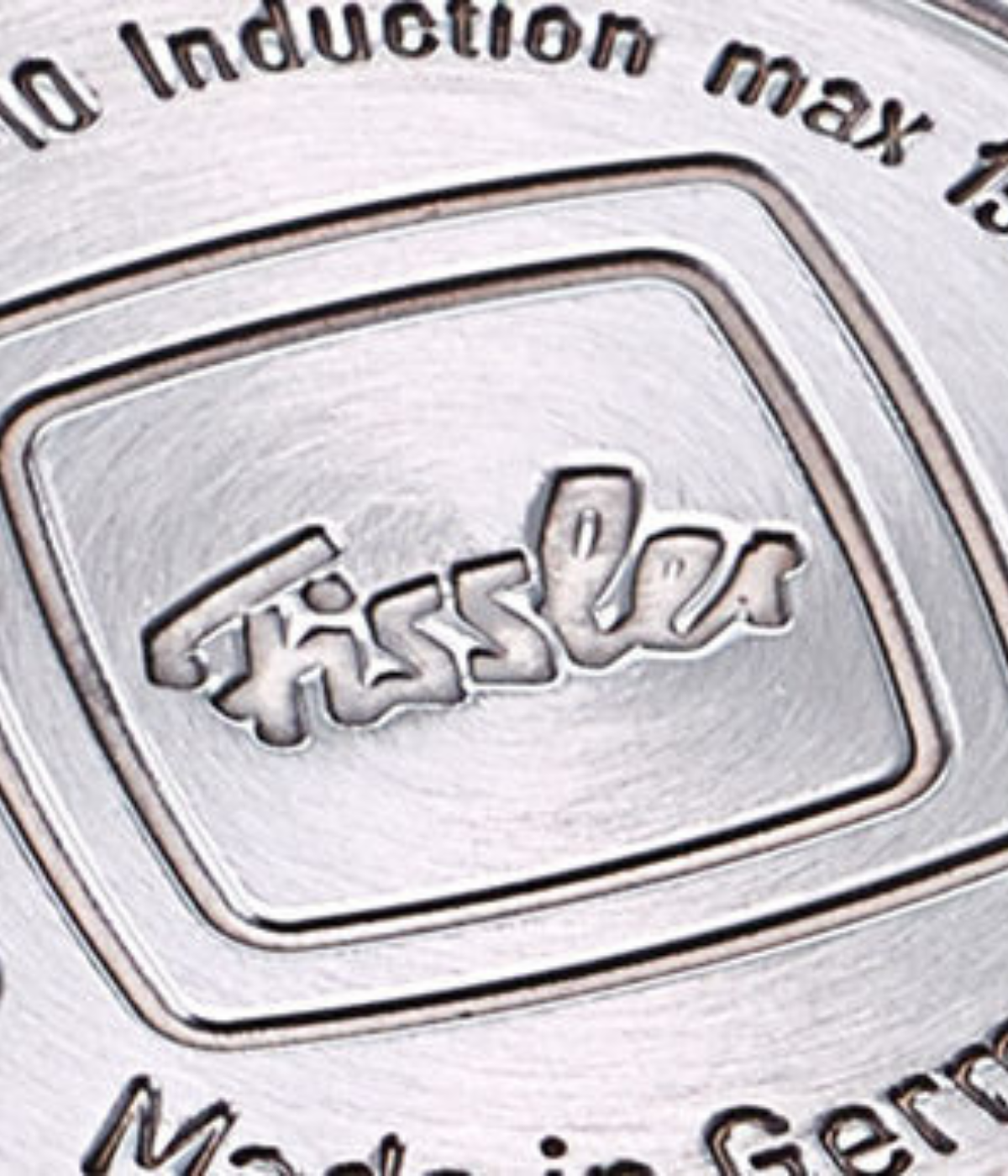 Close-up of an engraved Fissler logo and text on a cookware base, highlighting our stainless steel innovation made in Germany.